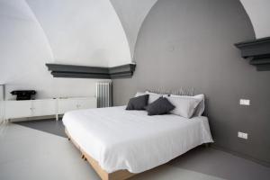 Posteľ alebo postele v izbe v ubytovaní Sipario