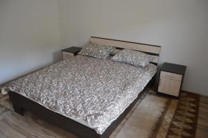 A bed or beds in a room at Apartment Sijakovic