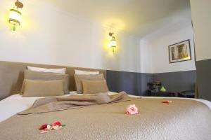 Postel nebo postele na pokoji v ubytování Riad 64 Maison D'hôtes & Spa