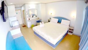 Voodi või voodid majutusasutuse P.A. Place Hotel toas