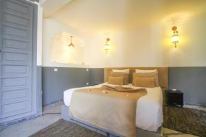 Postel nebo postele na pokoji v ubytování Riad 64 Maison D'hôtes & Spa