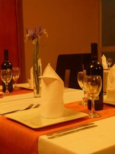 Ein Restaurant oder anderes Speiselokal in der Unterkunft Acuario Hotel & Suite 