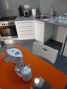 Kuchyňa alebo kuchynka v ubytovaní Claris Apartments