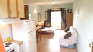 Postel nebo postele na pokoji v ubytování Pefka Studios & Apartments