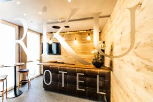 TV a/nebo společenská místnost v ubytování RiKu HOTEL Ulm
