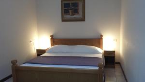 Posteľ alebo postele v izbe v ubytovaní Hotel Firenze 2000