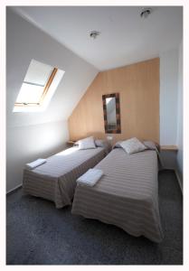 Postel nebo postele na pokoji v ubytování Hostal Mitre Paterna