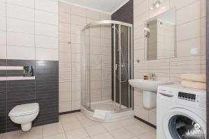 Kúpeľňa v ubytovaní Rezydencja Portowa 14 - Jantar Apartamenty