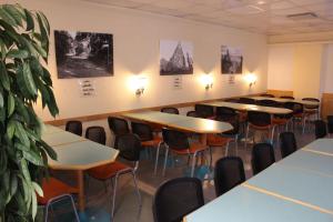 Ein Restaurant oder anderes Speiselokal in der Unterkunft Aapiskukko Hotel 