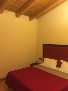 Tempat tidur dalam kamar di Hotel Motel Galaxy Reggio Emilia