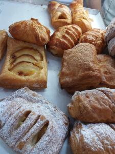 a bunch of different types of pastries on a table at BB Gallipolis Terra in Gallipoli