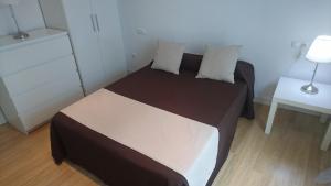 Cama o camas de una habitación en Apartamentos Córdoba Best II