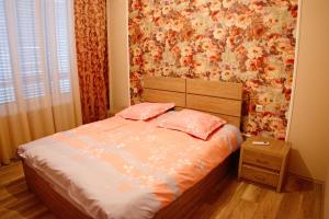 Postelja oz. postelje v sobi nastanitve Guest House Aisi