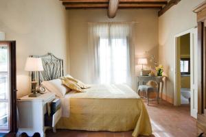 Voodi või voodid majutusasutuse Borgo I Vicelli Adults Only Relais toas