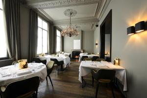Um restaurante ou outro lugar para comer em Hotel Messeyne