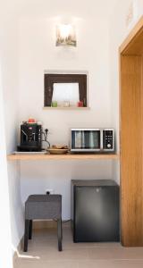 Kuchyň nebo kuchyňský kout v ubytování Trullo suite 59