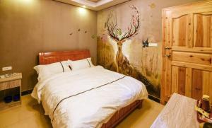 Ένα ή περισσότερα κρεβάτια σε δωμάτιο στο Joy Style Hostel