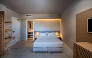 Domu Simius Life Style Hotel客房内的一张或多张床位