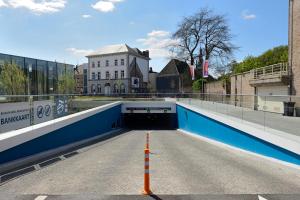 a tunnel in the middle of a city at Square Hotel in Kortrijk