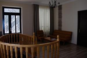 Predel za sedenje v nastanitvi Guest House Aisi