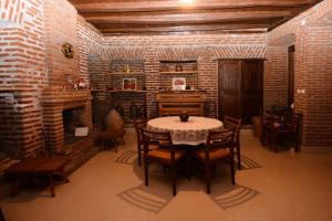 Predel za sedenje v nastanitvi Guest House Aisi