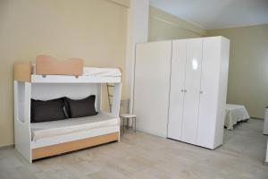 Katil dua tingkat atau katil-katil dua tingkat dalam bilik di Palazzo Greco Case Vacanze