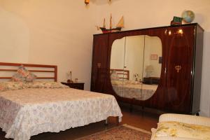 מיטה או מיטות בחדר ב-Tuscany Holiday Home