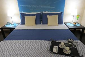 Mare Nostrum Petit Hôtel客房内的一张或多张床位