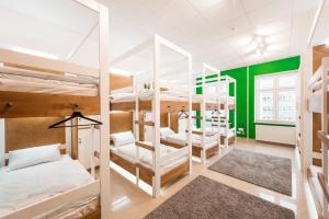 Двухъярусная кровать или двухъярусные кровати в номере Ginger ApartHostel