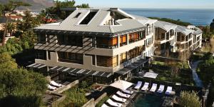 an aerial view of a house with a swimming pool at The Glen Apartments in Cape Town