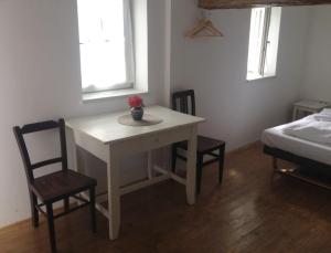 Posteľ alebo postele v izbe v ubytovaní Plitzner Belvárosi Apartmanház