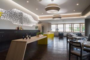 A restaurant or other place to eat at Hotel Carosello