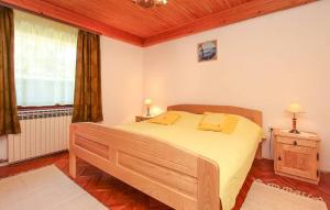 Postel nebo postele na pokoji v ubytování Apartments Zdravko