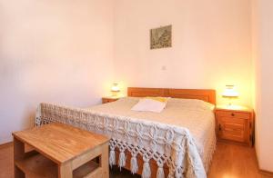 Postel nebo postele na pokoji v ubytování Apartments Zdravko