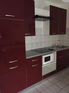 Kuchyňa alebo kuchynka v ubytovaní Apartment Melody