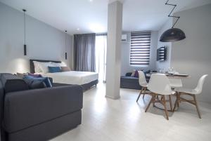 Postel nebo postele na pokoji v ubytování Acropolis Stay