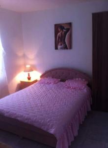 Voodi või voodid majutusasutuse Rooms Sijak toas