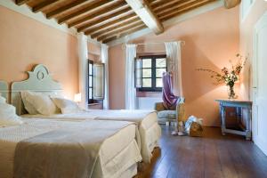 Voodi või voodid majutusasutuse Borgo I Vicelli Adults Only Relais toas