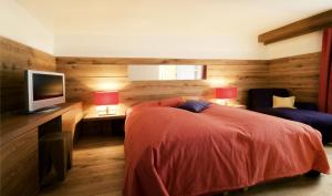 Hinterwies – Ski In / Lodge / Dine客房内的一张或多张床位
