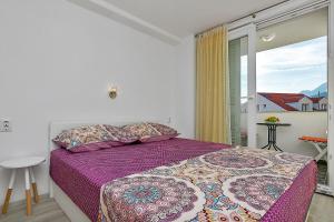 Postel nebo postele na pokoji v ubytování Guesthouse Josko