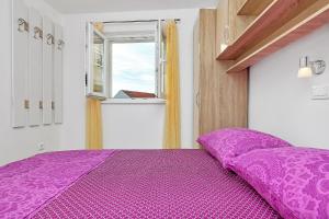 Postel nebo postele na pokoji v ubytování Guesthouse Josko