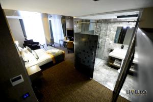 Postel nebo postele na pokoji v ubytování Livello Hotel + 37 fotografií