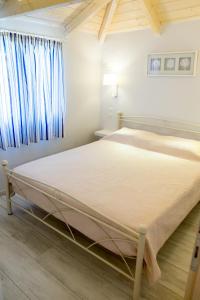 Postel nebo postele na pokoji v ubytování Villa Vanda