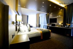 Postel nebo postele na pokoji v ubytování Livello Hotel