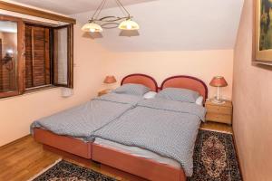 Posteľ alebo postele v izbe v ubytovaní Apartment Vrilo