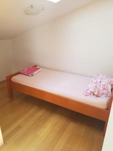 Posteľ alebo postele v izbe v ubytovaní Peachy House