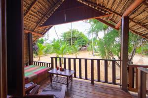 Balkón nebo terasa v ubytování Shiva's Beach Cabanas