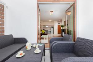 Posedenie v ubytovaní Apartamenty Platan