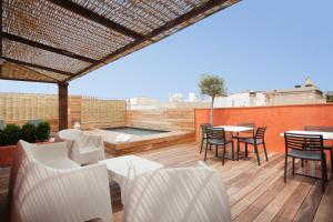 Balkón nebo terasa v ubytování Enjoybcn Colon Apartments