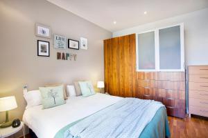 Posteľ alebo postele v izbe v ubytovaní Apartments Barcelona & Home Deco Viladomat